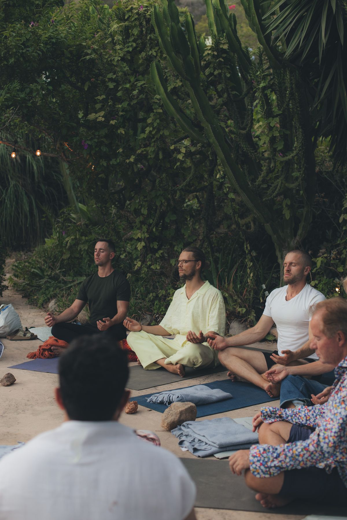Group meditation in a tropical garden, Ibiza 2023